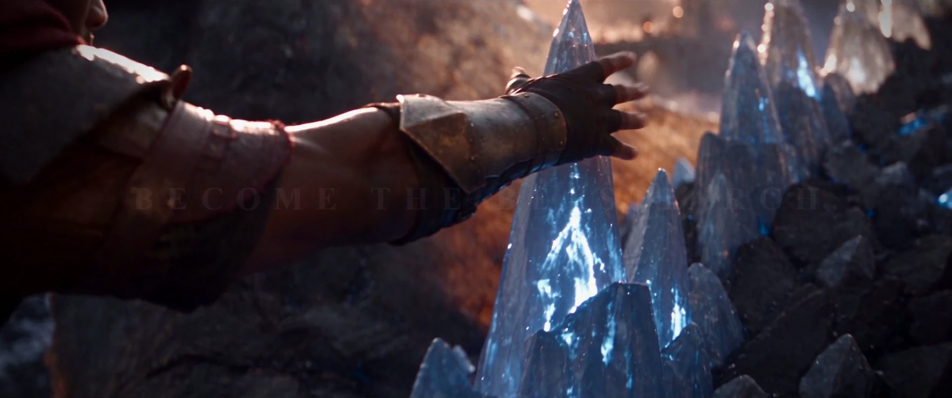 An armored hand reaching toward glowing crystal spines