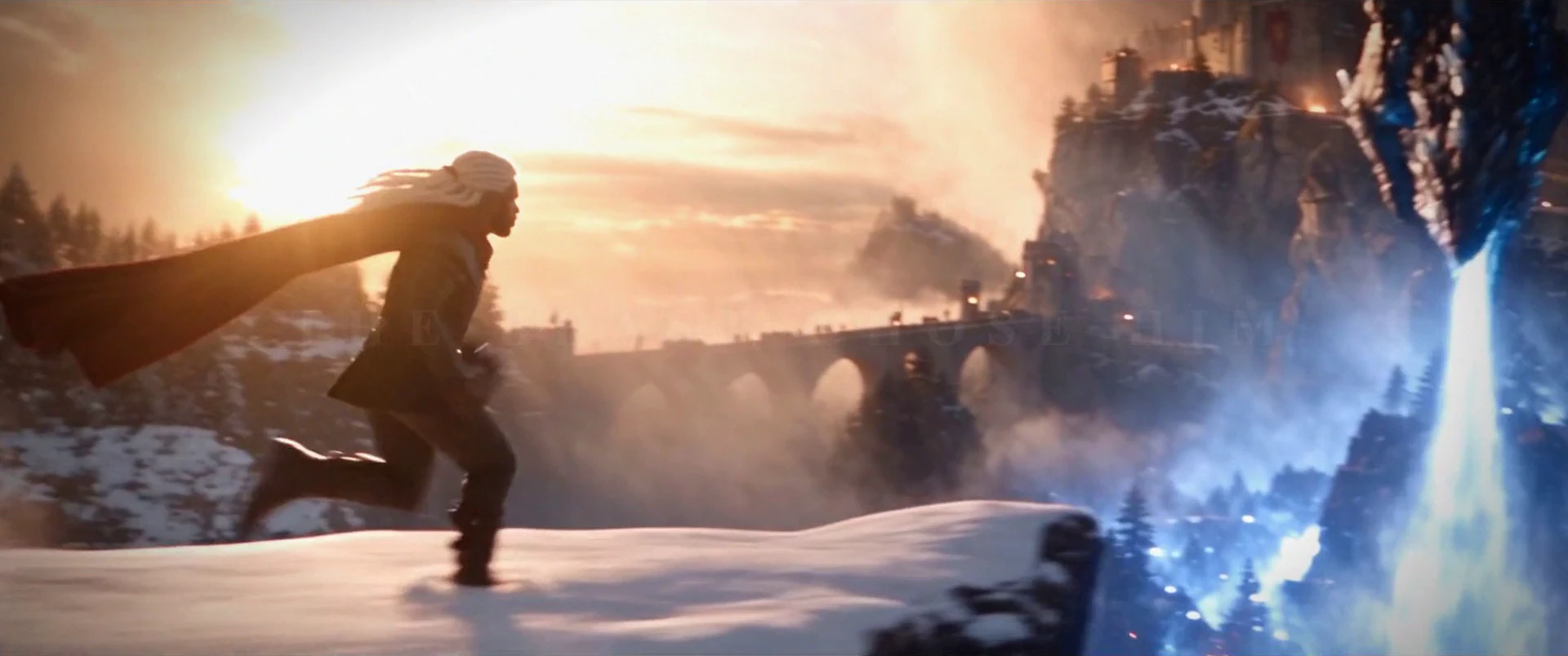 A cloaked adventurer running toward a dragon and distant castle
